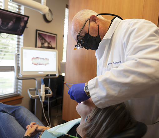 Dentist giving a patient a preventive dental exam