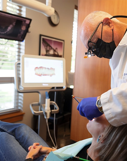 Dentist examining a patient's teeth